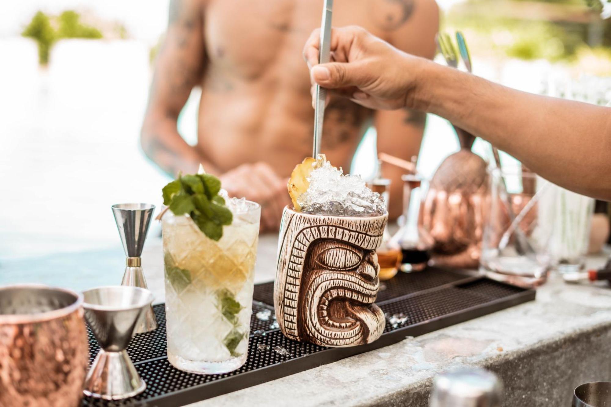 Skyview Resort Phuket Patong Beach Luaran gambar A tiki drink being stirred